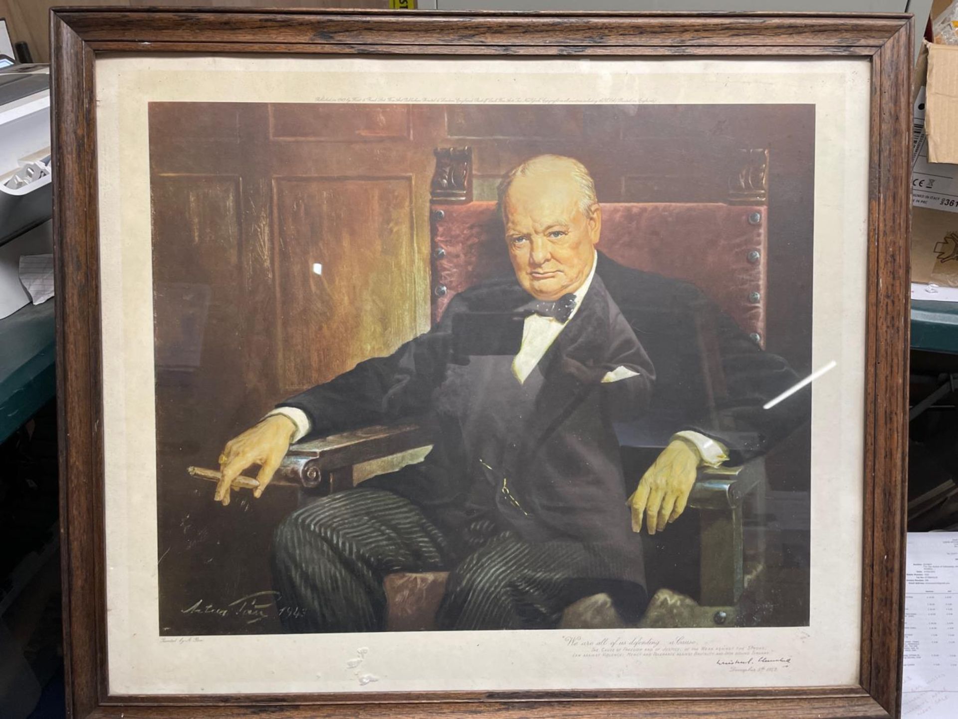 A FRAMED PRINT OF WINSTON CHURCHILL