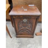 A LATE VICTORIAN OAK PURDONIUM WITH CARVED FRONT PANELS, GALVANISED LINER AND BRASS SHOVEL