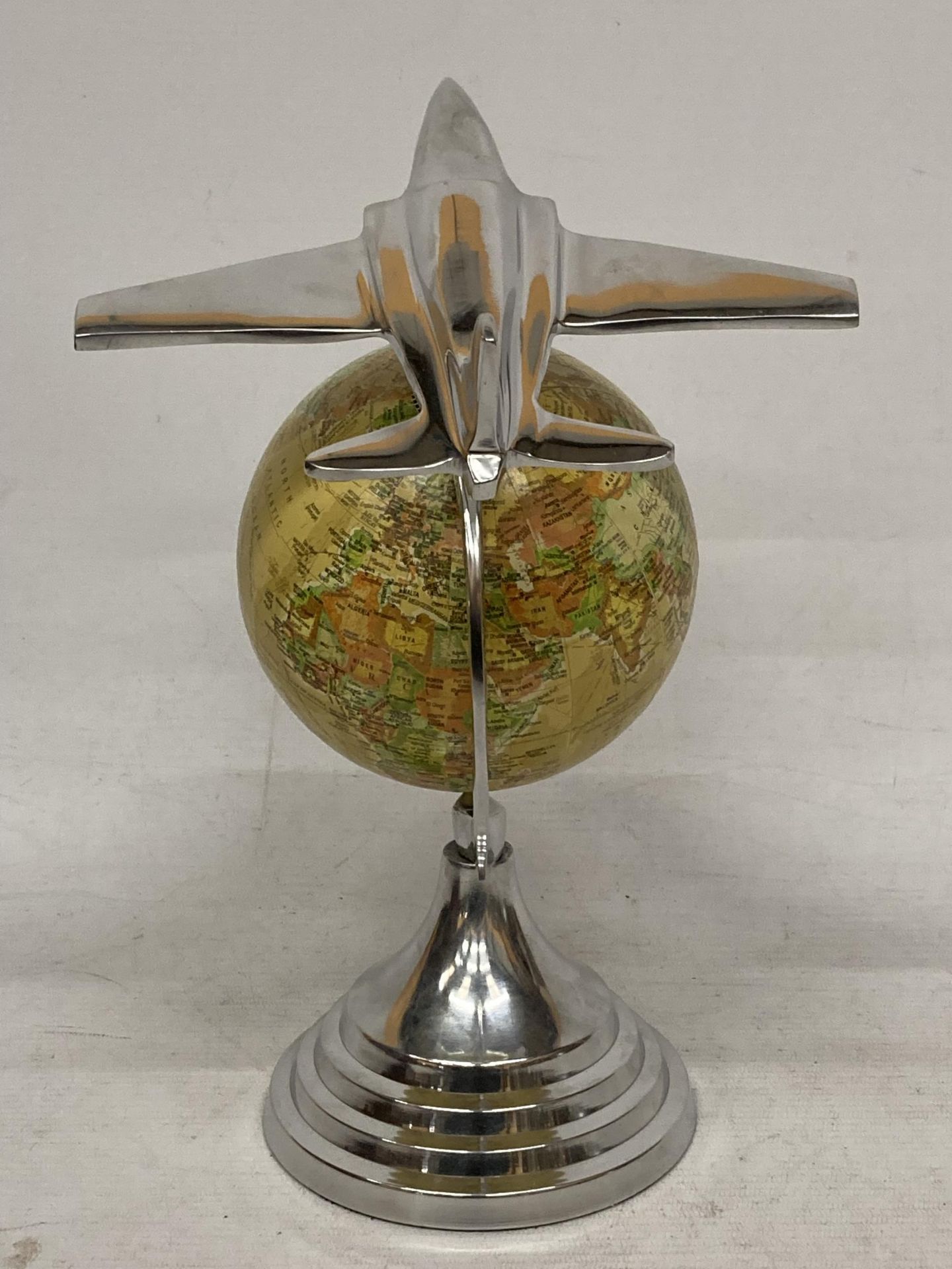 A DESK GLOBE WITH CHROME EFFECT BASE AND AEROPLANE DESIGN - Image 2 of 5