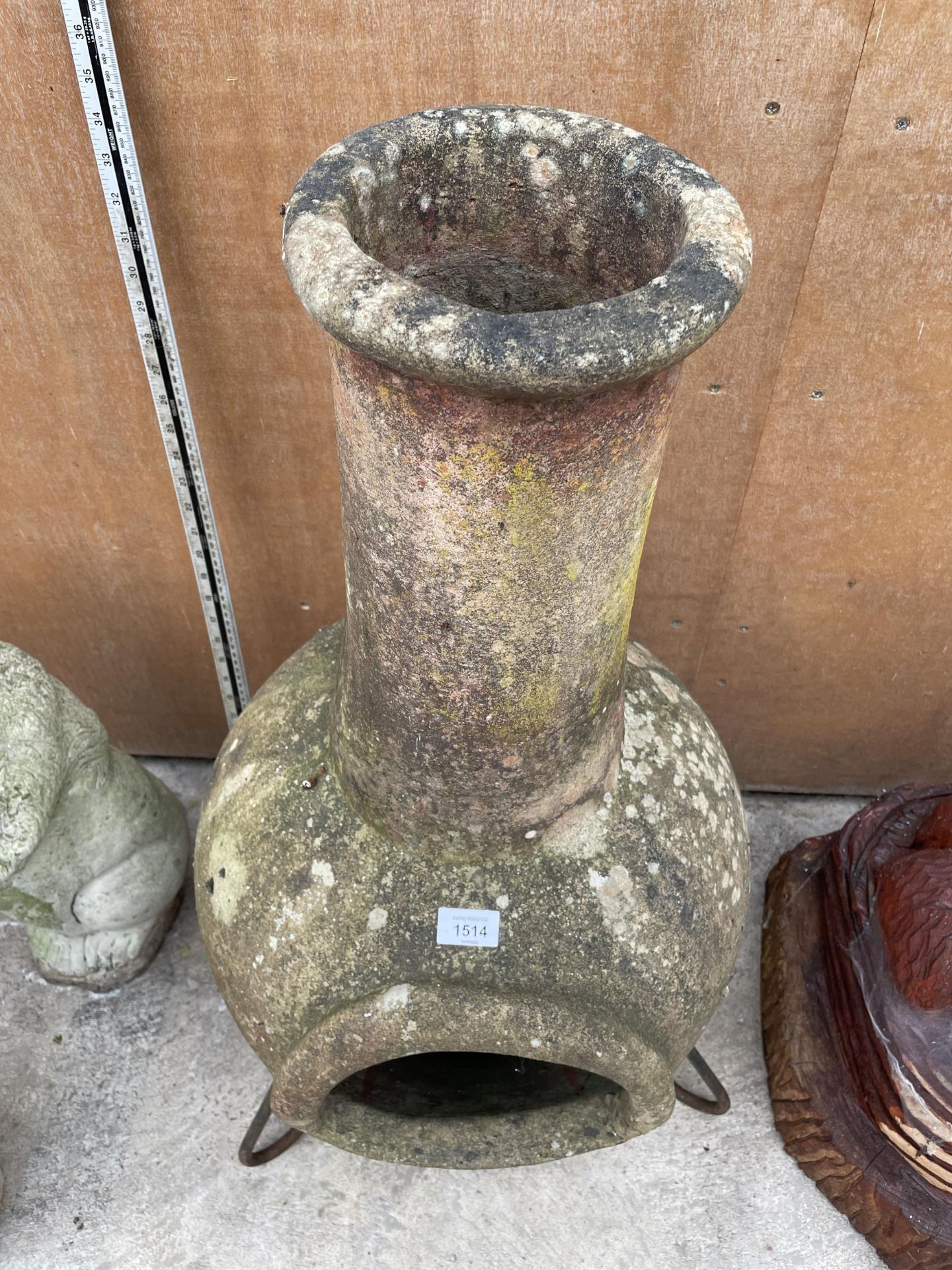 A RECONSTITUTED STONE GARDEN CHIMENEA WITH METAL STAND - Image 2 of 4