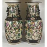 A HUGE PAIR OF LATE 19TH / EARLY 20TH CENTURY CHINESE CRACKLE GLAZE FLOOR VASES WITH WARRIORS IN