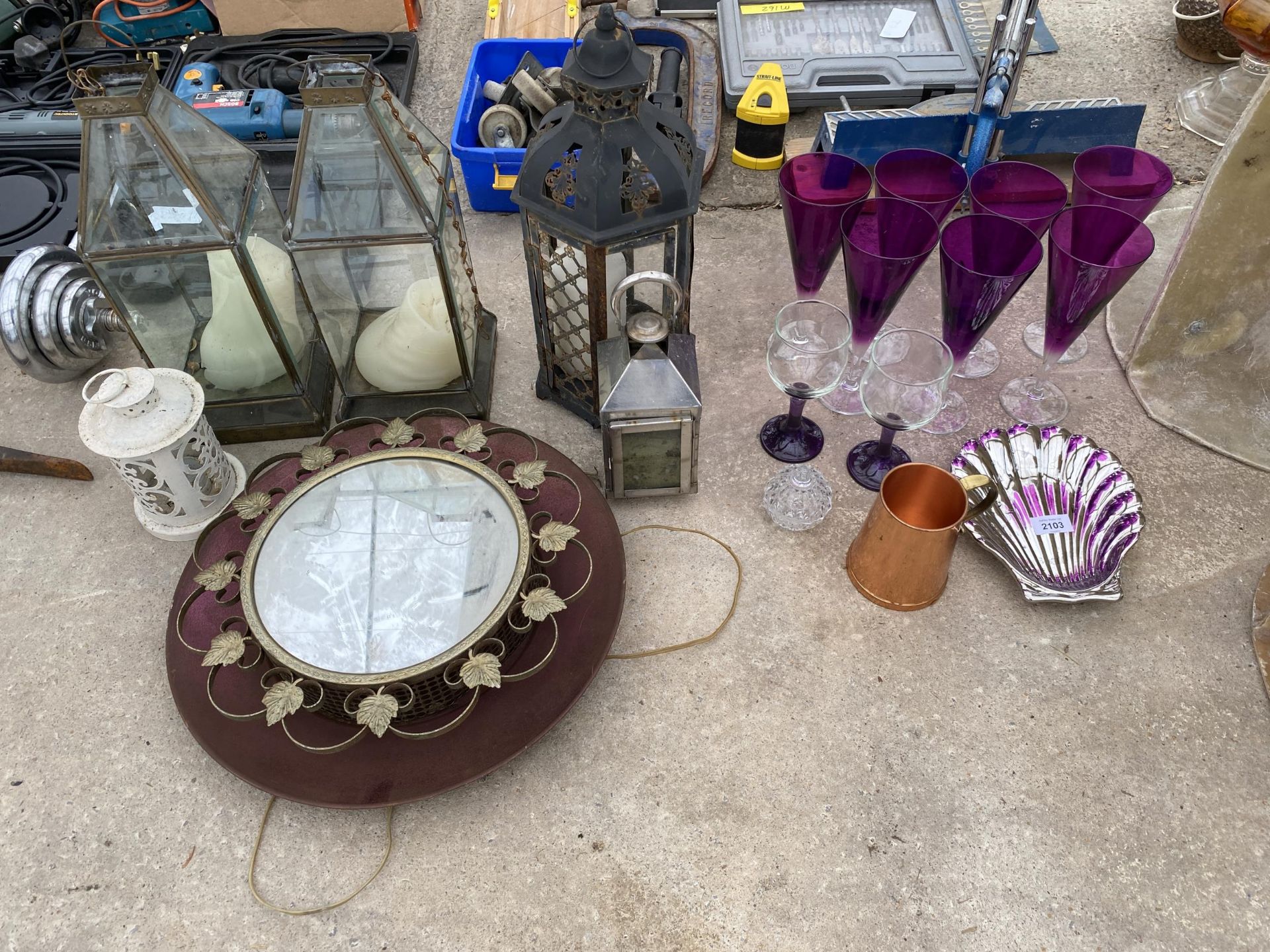 AN ASSORTMENT OF ITEMS TO INCLUDE WINE GLASSES AND CANDLE LANTERNS ETC