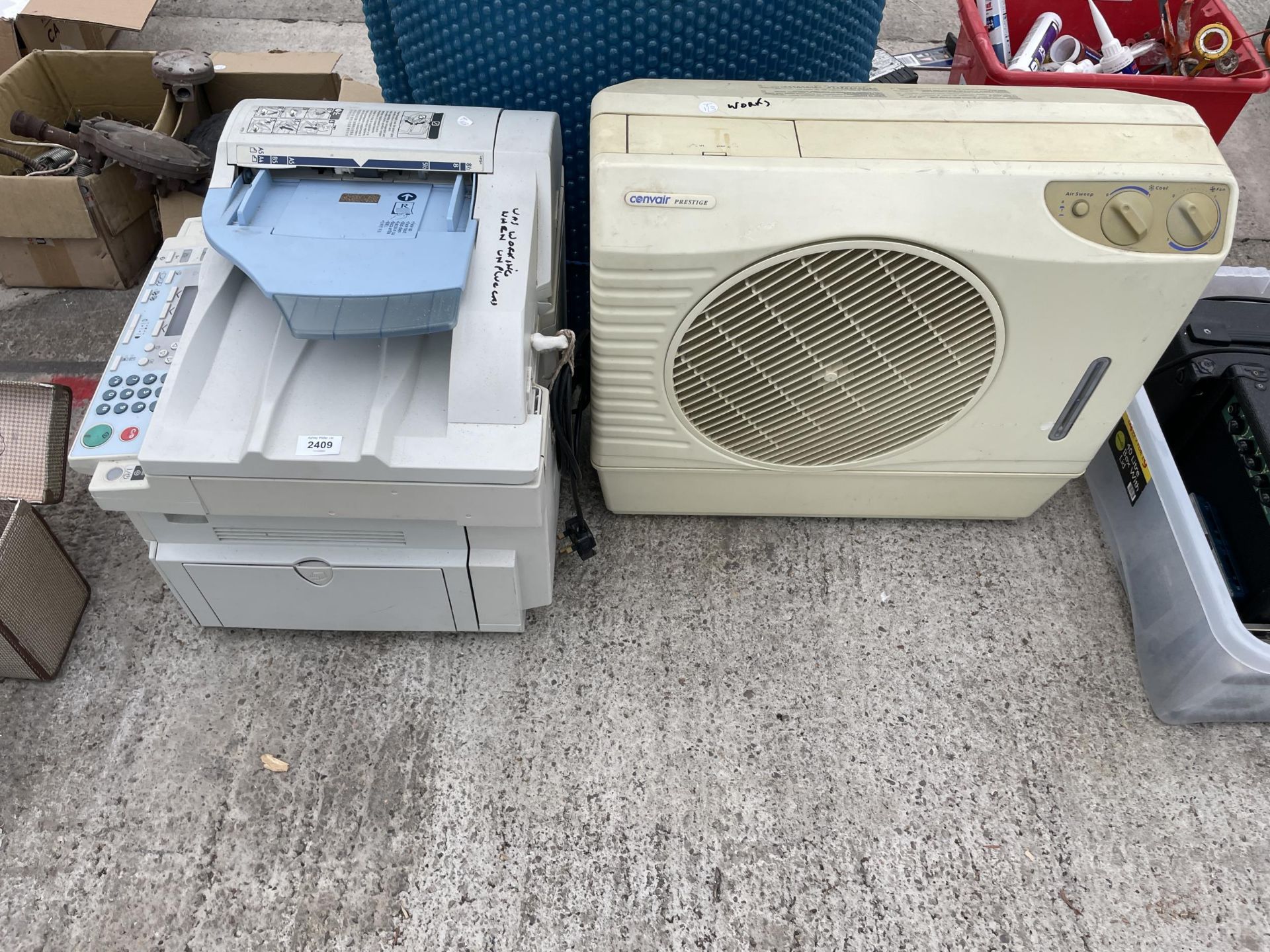 A RICOH PRINTER AND A CONVAIR AIR CONDITIONING UNIT