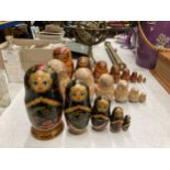 THREE SETS OF RUSSIAN STYLE NESTING DOLLS