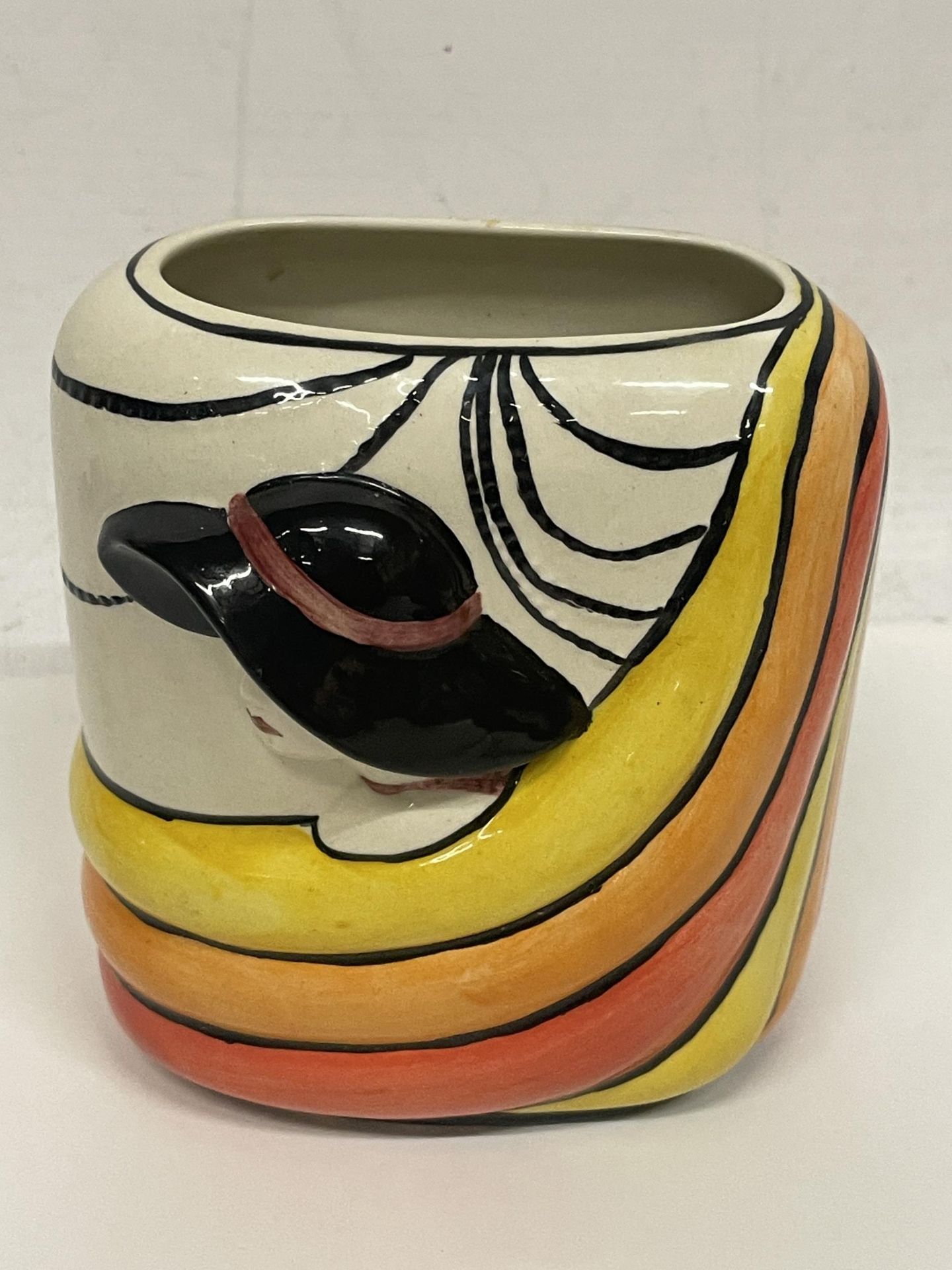 A LORNA BAILEY HANDPAINTED AND SIGNED ART DECO LADY VASE