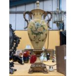 A LARGE FRENCH STYLE CREAM PEDESTAL LAMP WITH FLORAL DESIGN WITH METAL MOUNTS