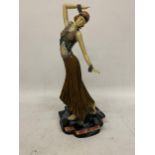 A LARGE HEAVY ART DECO LADY ON A PLINTH, HEIGHT 38CM