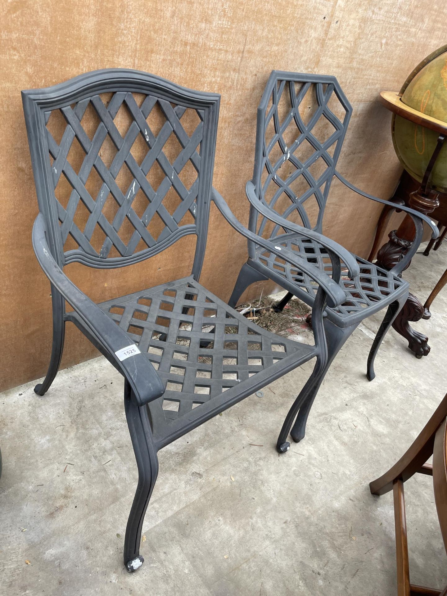 A NEAR PAIR OF CAST ALLOY CARVER CHAIRS