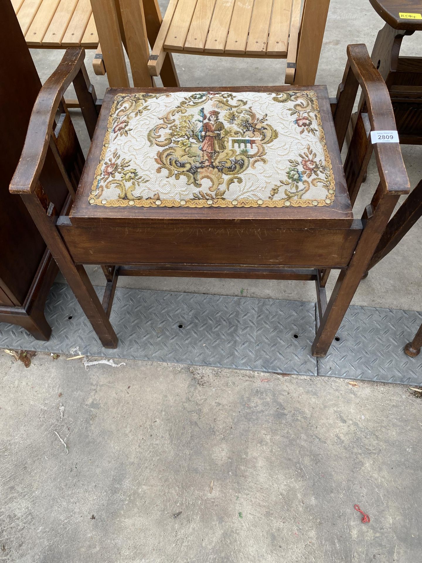 AN EDWARDIAN MAHOGANY AND INLAID PIANO STOOL WITH LIFT-UP LID