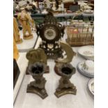 A QUANTITY OF VINTAGE BRASSWARE TO INCLUDE A LARGE MANTLE CLOCK WITH FIGURES, A FISH ON A PLINTH,