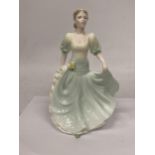 A COALPORT FIGURINE FROM THE LADIES OF FASHION "HONEYMOON"