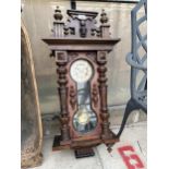 A VINTAGE MAHOGANY VIENNA CHIMING WALL CLOCK