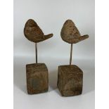 A PAIR OF DECORATIVE STONE BIRDS ON PLINTHS, HEIGHT 24CM