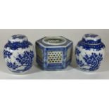 THREE ITEMS - A PAIR OF JAPANESE BLUE AND WHITE FLORAL GINGER JARS AND A RETICULATED POT, HEIGHT