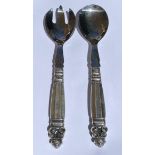 AN ART DECO GEORG JENSEN STERLING SILVER TWO PIECE SALAD SERVER SET IN THE ACORN PATTERN -