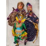 A GROUP OF THREE VINTAGE PAINTED WOODEN PUPPETS