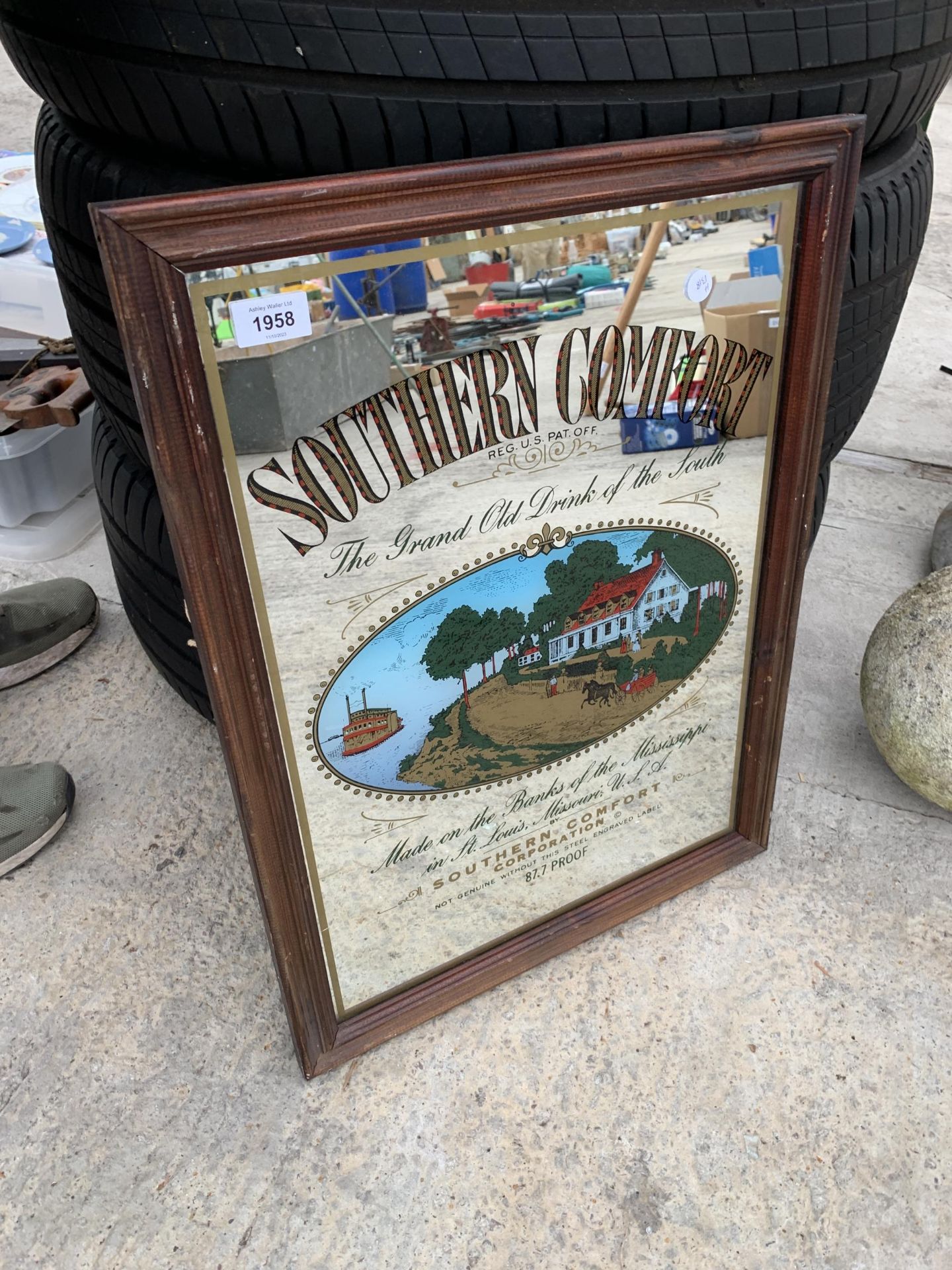 A FRAMED SOUTHERN COMFORT ADVERTISING MIRROR