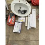 AN ASSORTMENT OF ITEMS TO INCLUDE A BATHROOM SINK, BASIN TAPS AND A SOAP DISPENSER ETC