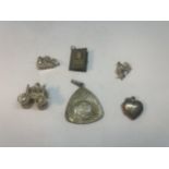 SIX SILVER ITEMS TO INCLUDE FIVE CHARMS AND A PENDANT