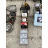 A LARGE ASSORTMENT OF HARDWARE TO INCLUDE PLUG SOCKETS, WORK LIGHTS AND A CAR RADIO ETC