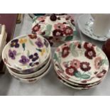 A COLLECTION OF EMMA BRIDGEWATER POTTERY TO INCLUDE A BUTTER DISH AND BOWLS IN A FLORAL PATTERN