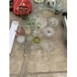 AN ASSORTMENT OF GLASS WARE TO INCLUDE VASES AND CAKE STANDS ETC