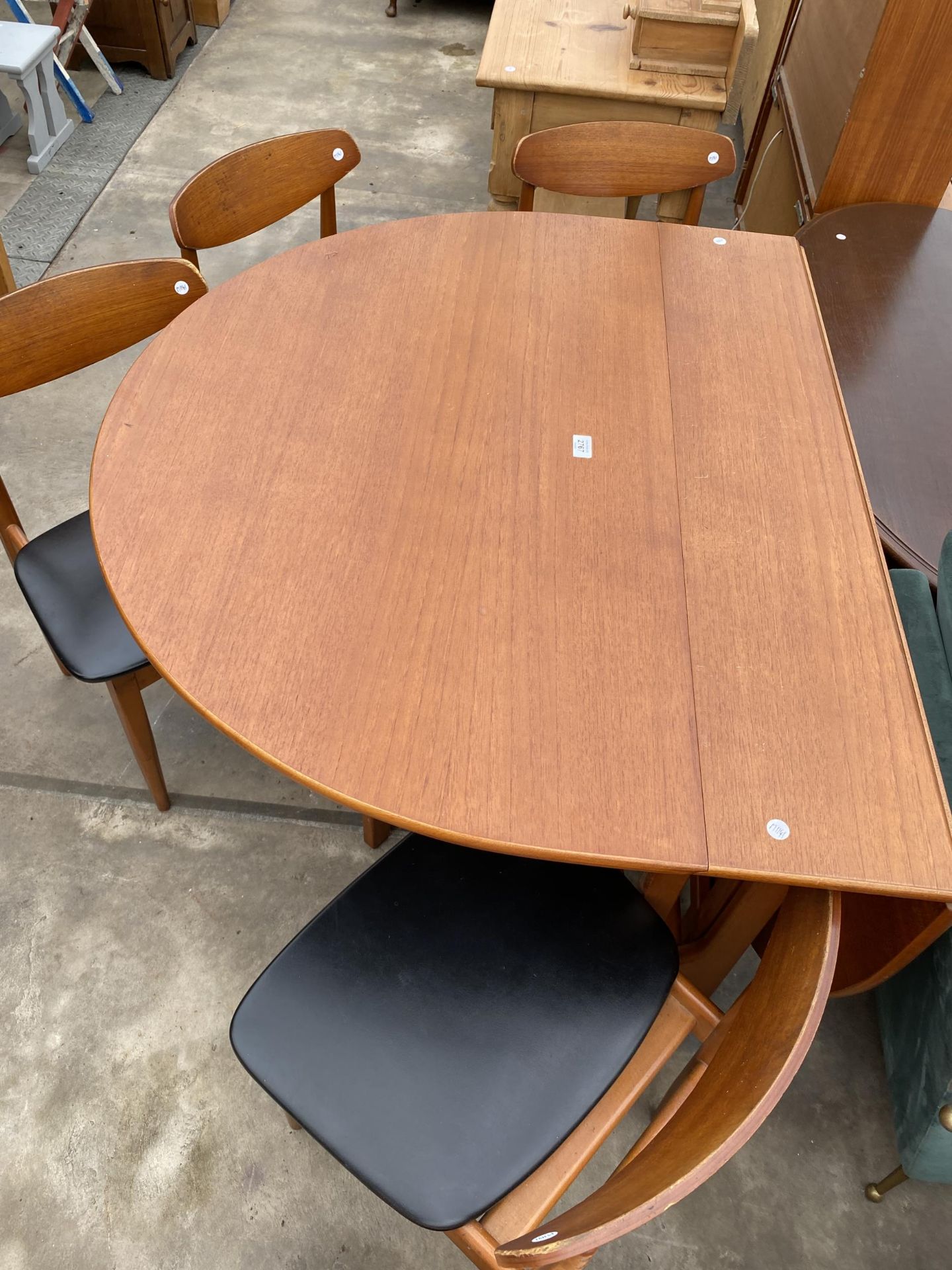 A RETRO TEAK GATELEG DINING TABLE, 60 X 42" OPENED AND FOUR DINING CHAIRS WITH BLACK FAUX LEATHER - Image 4 of 4