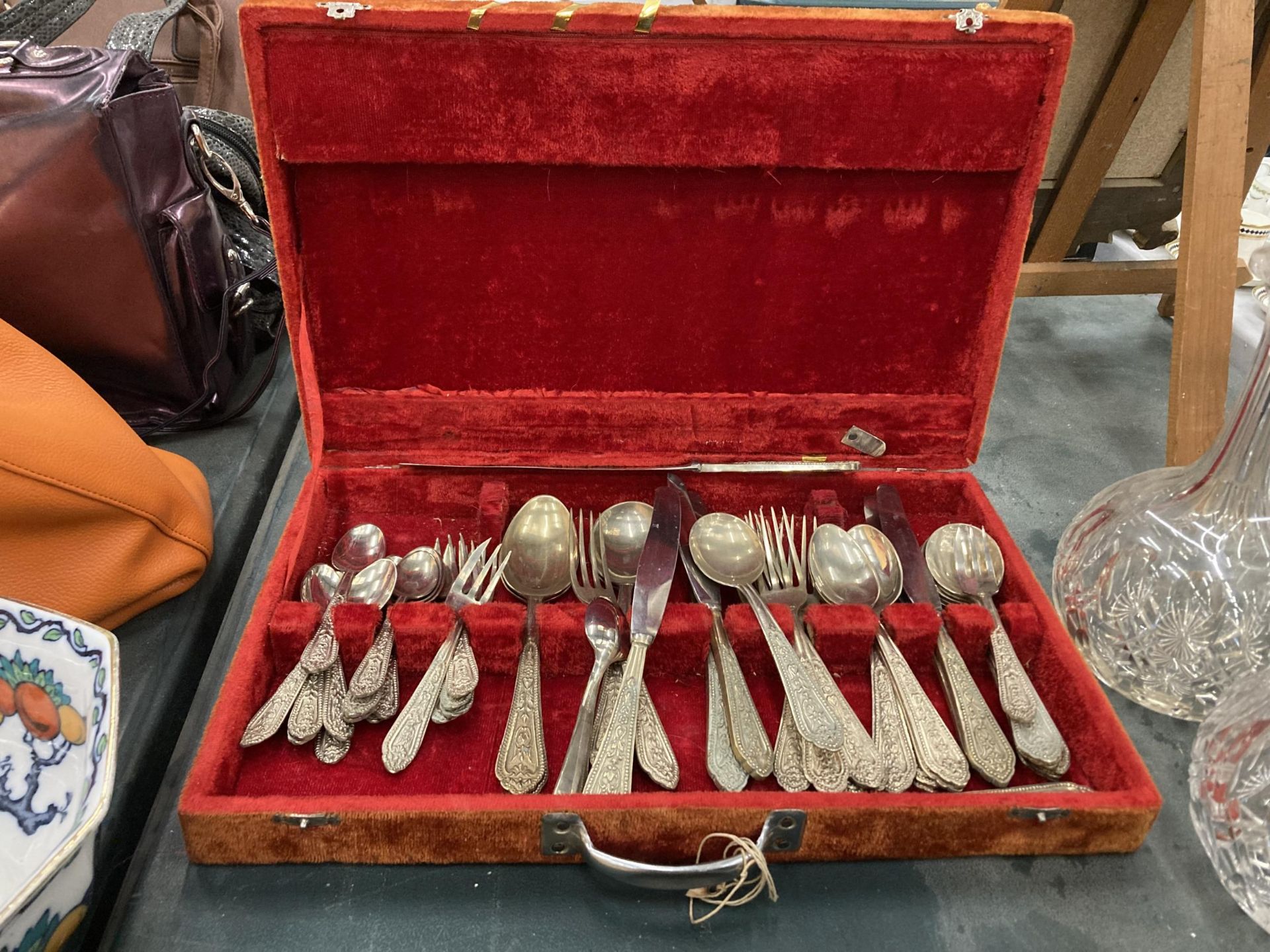 A CASED CANTEEN OF CUTLERY MARKED GERMAN SILVER