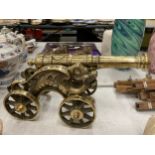 A VINTAGE BRASS MODEL OF A CANNON