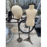 A VINTAGE MINIATURE TORSO MANNEQUIN AND A HEAD BOTH ON CAST IRON STANDS