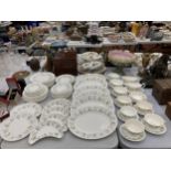 A VERY LARGE QUANTITY OF MINTON 'SPRING VALLEY' DINNERWARE TO INCLUDE VARIOUS SIZES OF PLATES,