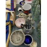 A MIXED LOT TO INCLUDE SILVER PLATED CANDLESTICKS, BOWLS WITH BLUE GLASS LINERS, A ROSE BOWL,