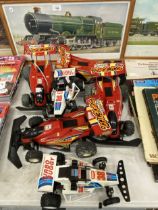 A GROUP OF RACING BUGGY TOY CARS