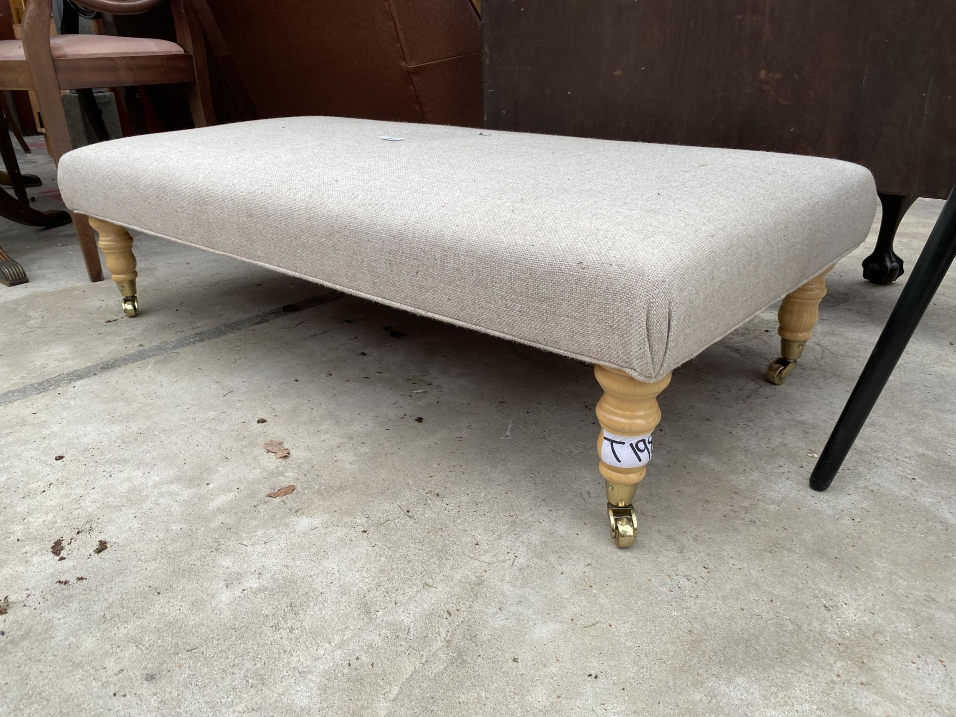 A VICTORIAN STYLE STOOL ON TURNED LEGS WITH BRASS CASTERS, 45 X 23" - Bild 2 aus 2