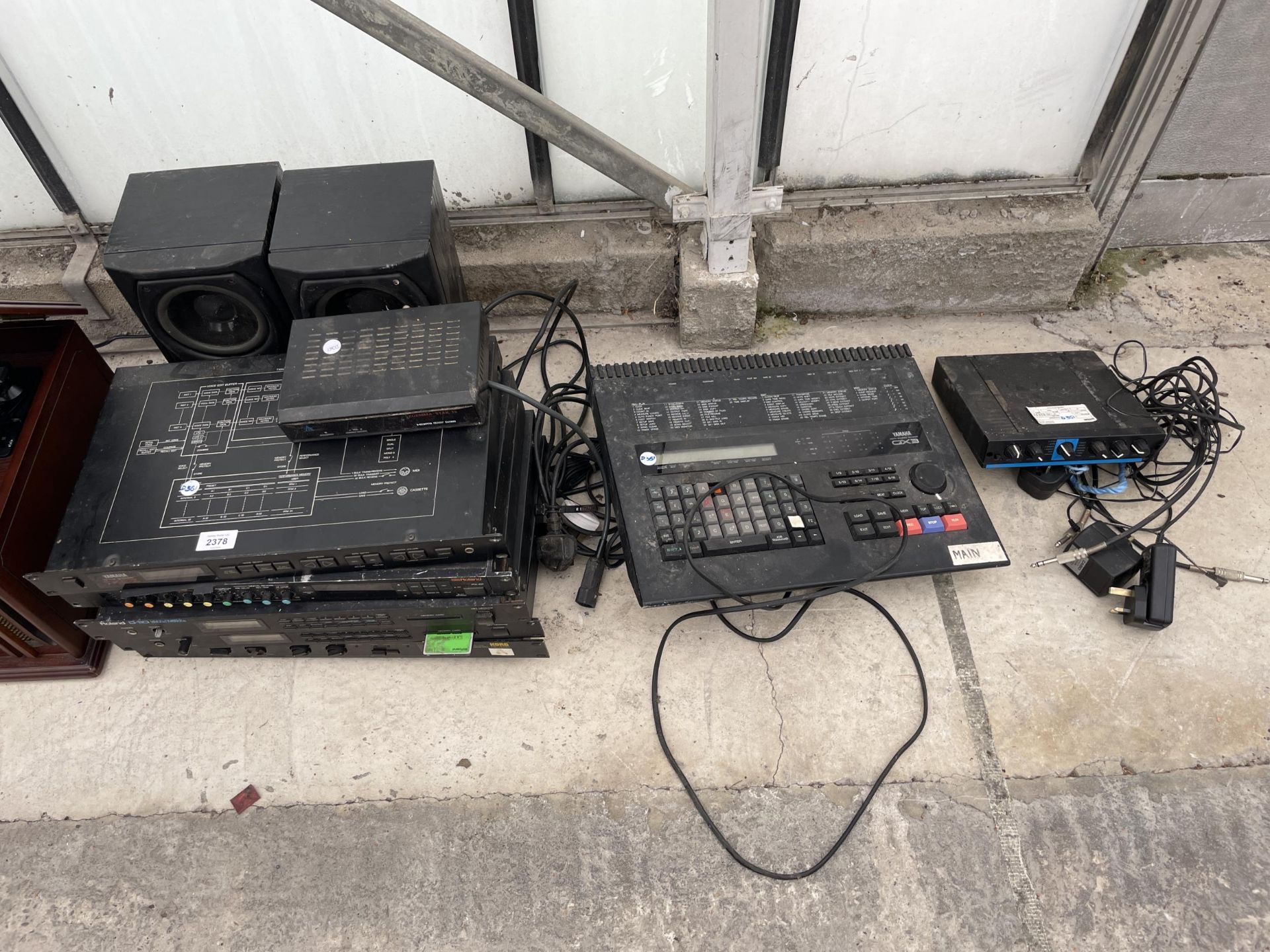 AN ASSORTMENT OF ITEMS TO INCLUDE SPEAKERS, A SEQUENCE RECORDER AND SOUND MODULES ETC