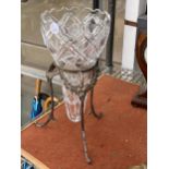 A VINTAGE CUT GLASS VASE WITH SILVER PLATED TRIPOD STNAD