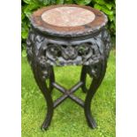 A 19TH CENTURY CHINESE QING CARVED HARDWOOD AND MARBLE TOPPED JARDINIERE PLANT STAND