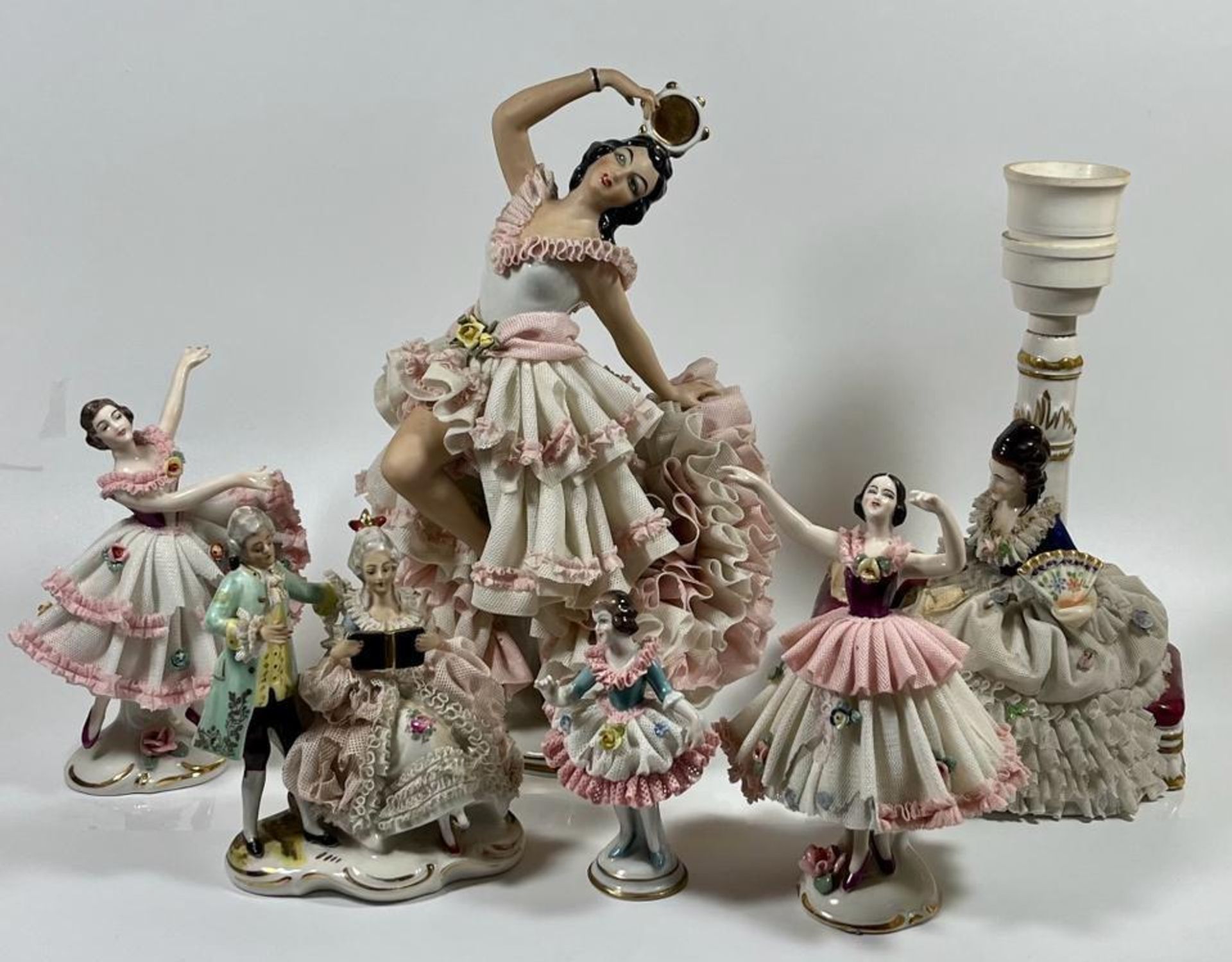 A GROUP OF SIX ANTIQUE CONTINENTAL DRESDEN LACE FIGURES TO INCLUDE LARGE ERNST BOHNE & SONS FLAMENCO