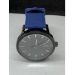 A GENTS FASHION WRIST WATCH SEEN WORKING BUT NO WARRANTY