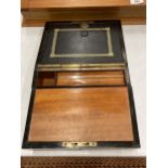 A WALNUT WRITING SLOPE BOX WITH INNER BLACK LEATHER WRITING SECTION