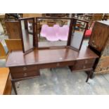 A STAG MINSTREL DRESSING TABLE WITH TRIPLE MIRROR, 60" WIDE