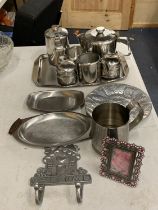 ASTAINLESS STEEL TEASET TO INCLUDE A TRAY, TEAPOT, HOT WATER JUG, CREAM JUG, SUGAR BOWL, CRUET