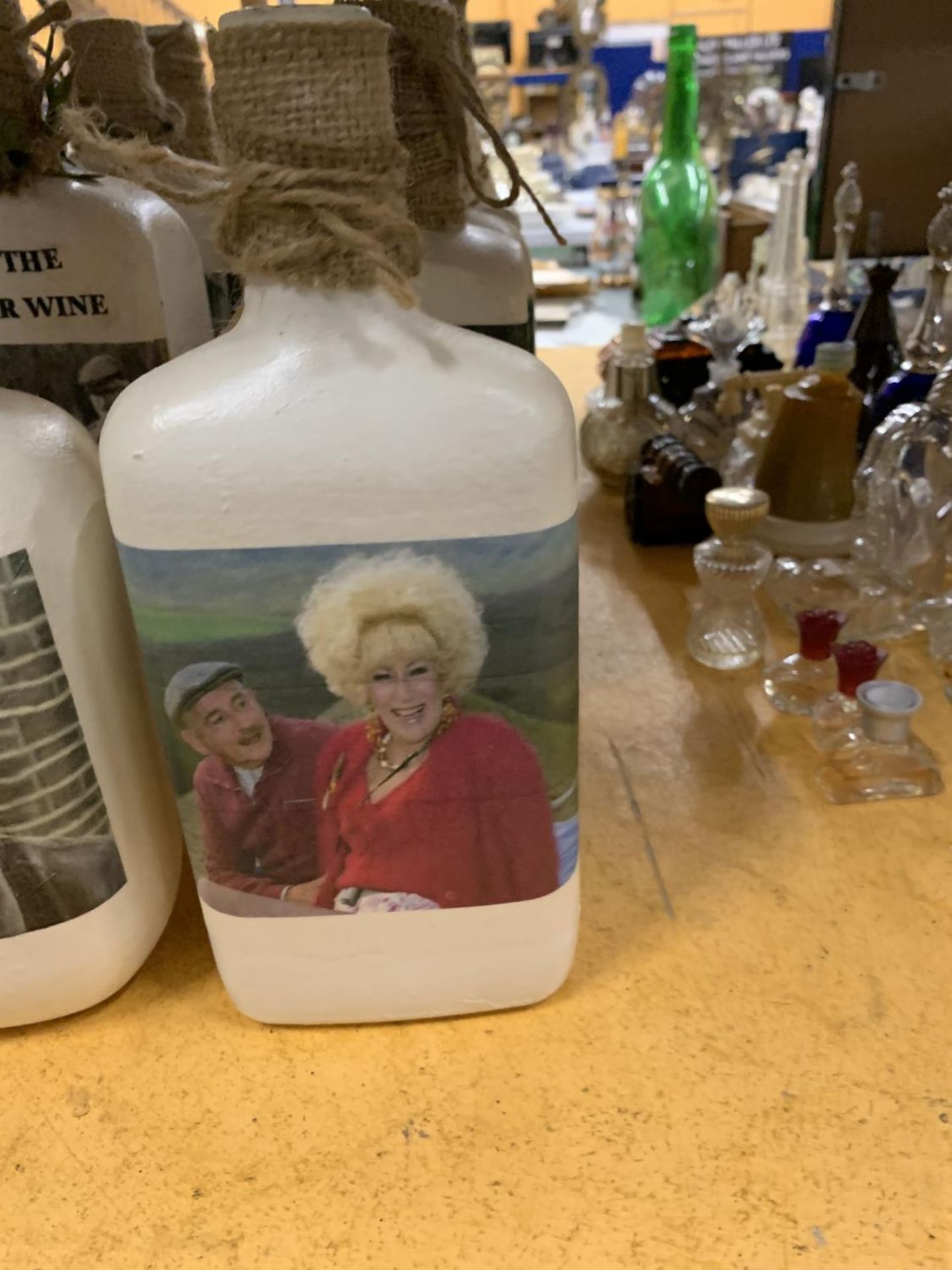 A COLLECTION OF 'LAST OF THE SUMMER WINE' THEMED BOTTLES PLUS TWO BOTTLES PAINTED WITH HIGHLAND - Image 2 of 3