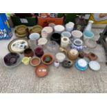 AN ASSORTMENT OF CERAMIC PLANT POTS AND CANDLE HOLDERS ETC