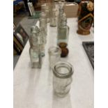 A COLLECTION OF VINTAGE MEDICINE AND CHEMISTS BOTTLES ETC