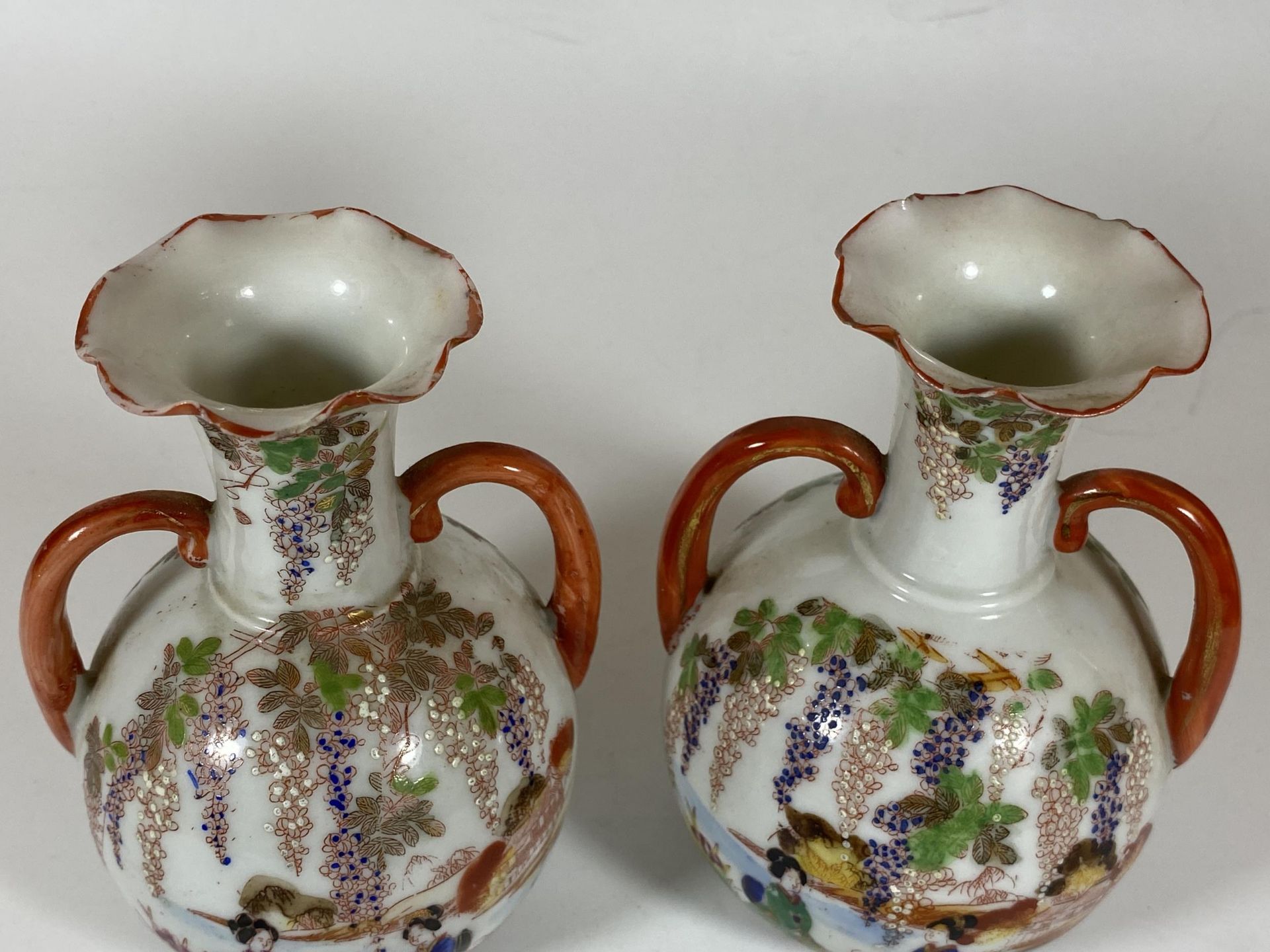 A PAIR OF JAPANESE TWIN HANDLED PORCELAIN VASES WITH LAKESIDE SCENE, HEIGHT 14CM - Image 2 of 6