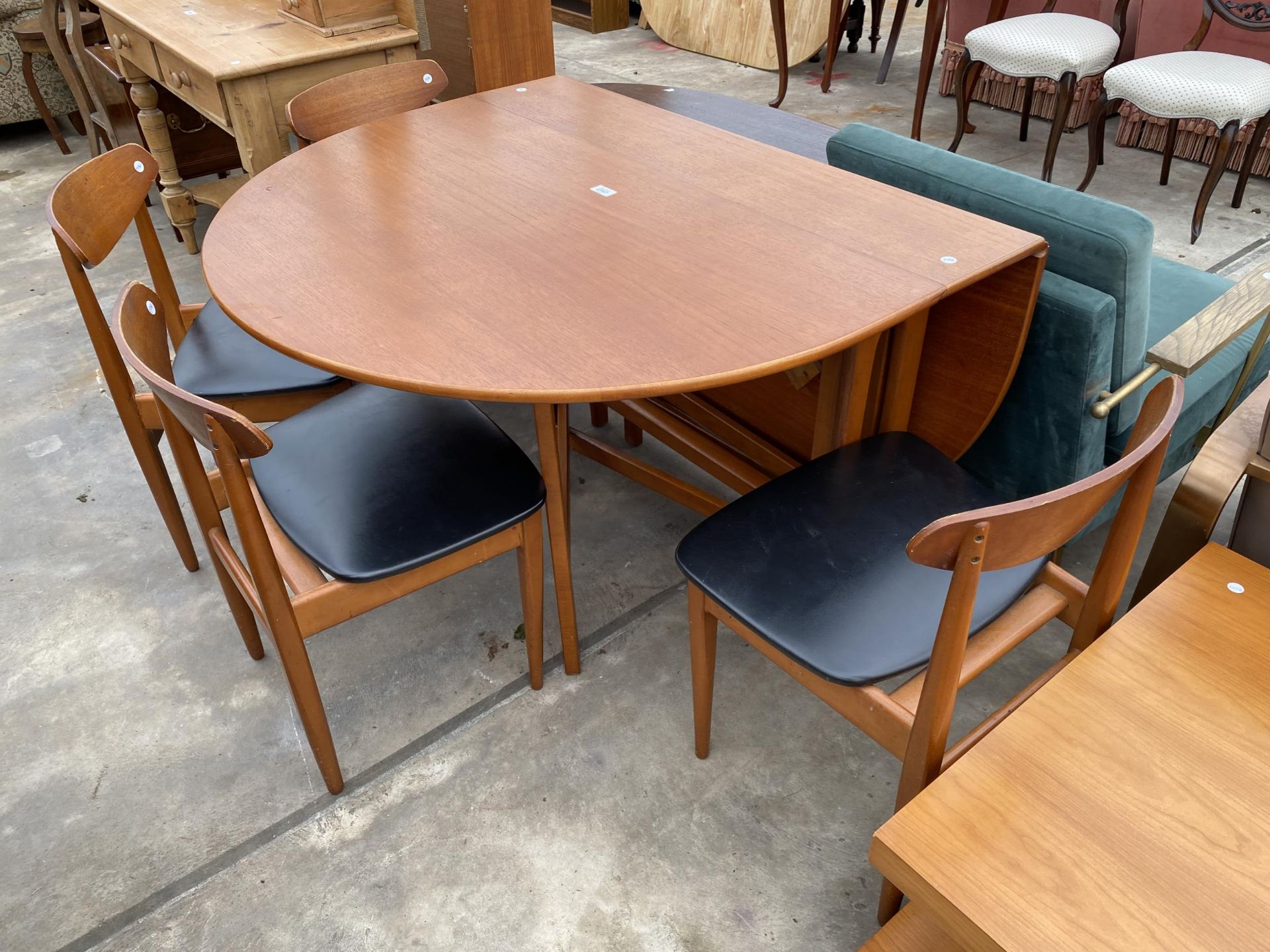 A RETRO TEAK GATELEG DINING TABLE, 60 X 42" OPENED AND FOUR DINING CHAIRS WITH BLACK FAUX LEATHER - Image 2 of 4