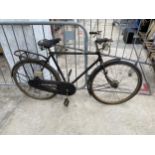 A VINTAGE GENTS BIKE WITH LEATHER SADDLE