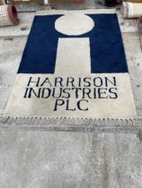 A BLUE AND CREAM 'HARRISON INDUSTRIES PLC' RUG