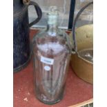 A VINTAGE GLASS POISON BOTTLE WITH GLASS STOPPER